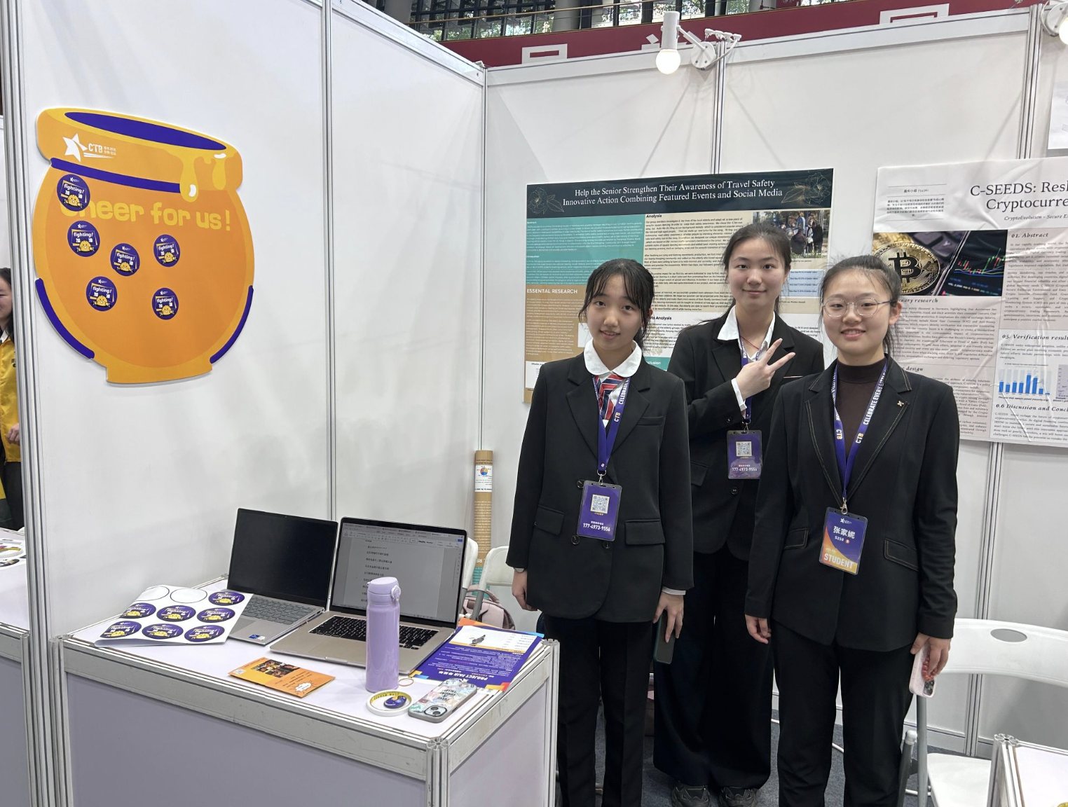 The team standing at their China Thinks Big project booth